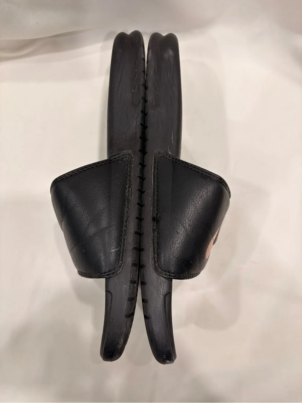Woman’s Nike Benassi Black and Rose Gold Slides Size 7